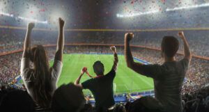 fans en un estadio de fútbol
